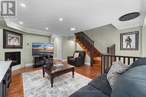 227 - 60 Rosewood Avenue, Mississauga, ON - Indoor Photo Showing Living Room With Fireplace