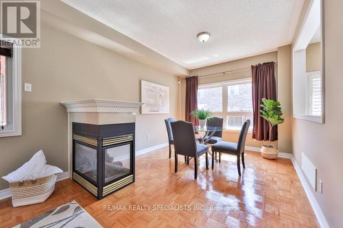 225 Andrews Trail, Milton, ON - Indoor Photo Showing Dining Room With Fireplace