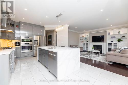 3316 Stalybridge Drive, Oakville, ON - Indoor Photo Showing Kitchen With Fireplace With Upgraded Kitchen