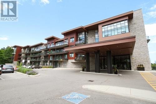 302 - 1575 Lakeshore Road W, Mississauga, ON - Outdoor With Facade
