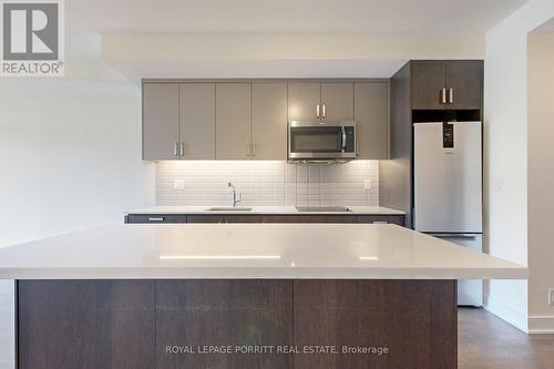 302 - 1575 Lakeshore Road W, Mississauga, ON - Indoor Photo Showing Kitchen With Upgraded Kitchen