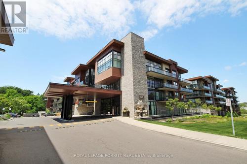 302 - 1575 Lakeshore Road W, Mississauga, ON - Outdoor With Balcony With Facade