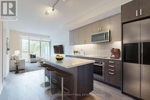 302 - 1575 Lakeshore Road W, Mississauga, ON - Indoor Photo Showing Kitchen With Upgraded Kitchen