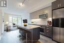 302 - 1575 Lakeshore Road W, Mississauga, ON  - Indoor Photo Showing Kitchen With Upgraded Kitchen 