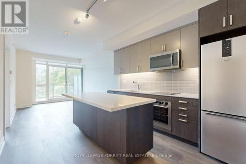 302 - 1575 Lakeshore Road W, Mississauga, ON - Indoor Photo Showing Kitchen With Upgraded Kitchen