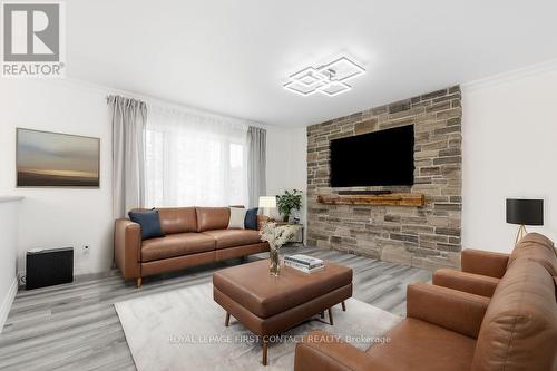 7765 5Th Line, Essa, ON - Indoor Photo Showing Living Room With Fireplace