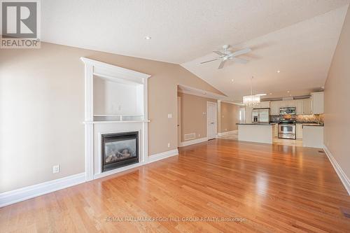 140 Greenway Drive, Wasaga Beach, ON - Indoor Photo Showing Living Room With Fireplace