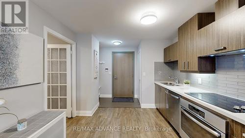 210 - 18 Uptown Drive E, Markham, ON - Indoor Photo Showing Kitchen With Double Sink