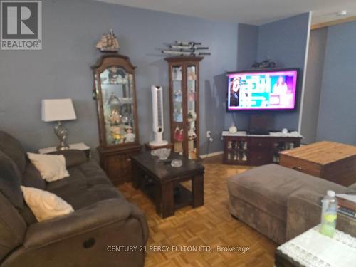 804 - 3420 Eglinton Avenue E, Toronto, ON - Indoor Photo Showing Living Room