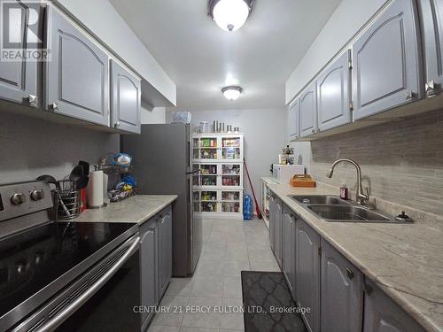 804 - 3420 Eglinton Avenue E, Toronto, ON - Indoor Photo Showing Kitchen With Double Sink