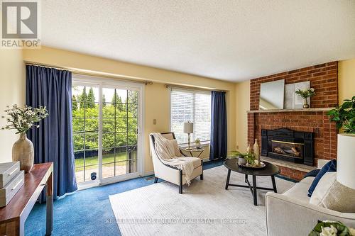 2 Hampstead Gate, Clarington, ON - Indoor Photo Showing Living Room With Fireplace