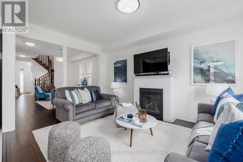 15 Thomas Bird Street, Clarington, ON - Indoor Photo Showing Living Room With Fireplace