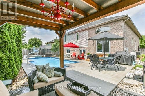 909 Fogerty Street, London, ON - Outdoor With In Ground Pool With Deck Patio Veranda With Exterior