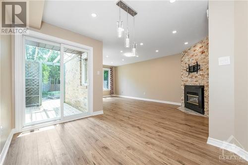 156 Knudson Drive, Ottawa, ON - Indoor With Fireplace