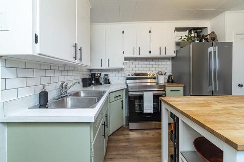 48 Emerald Street N, Hamilton, ON - Indoor Photo Showing Kitchen With Double Sink