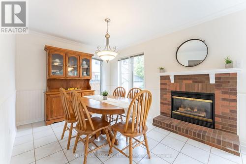 220 Fellowes Crescent, Hamilton, ON - Indoor Photo Showing Dining Room With Fireplace
