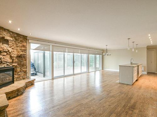 Vue d'ensemble - 3325 Rue Des Luminaires, Sainte-Adèle, QC - Indoor Photo Showing Living Room With Fireplace