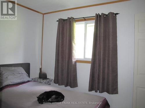 203 Crosby Drive, Kawartha Lakes, ON - Indoor Photo Showing Bedroom