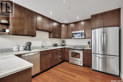 407 2300 Broad Street, Regina, SK - Indoor Photo Showing Kitchen With Double Sink