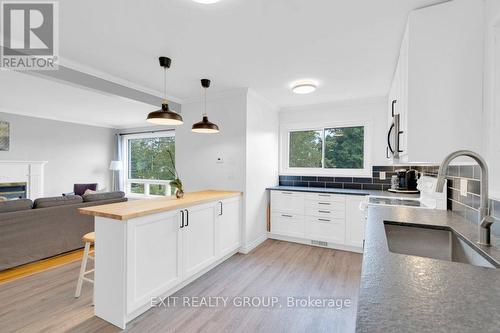 2 Munro Avenue, Belleville, ON - Indoor Photo Showing Kitchen With Fireplace