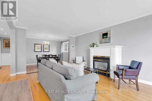 2 Munro Avenue, Belleville, ON - Indoor Photo Showing Living Room With Fireplace