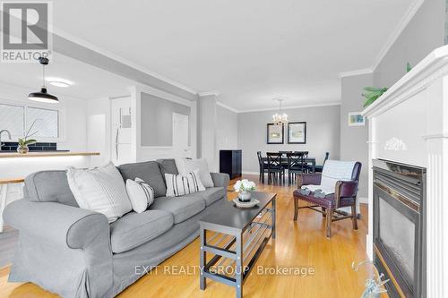 2 Munro Avenue, Belleville, ON - Indoor Photo Showing Living Room With Fireplace