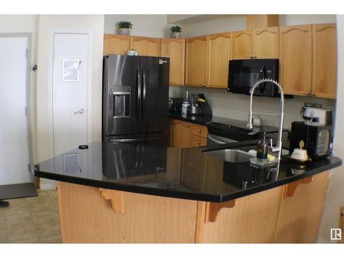 #305 4304 139 Av Nw, Edmonton, AB - Indoor Photo Showing Kitchen With Double Sink