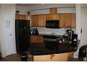 #305 4304 139 Av Nw, Edmonton, AB  - Indoor Photo Showing Kitchen With Double Sink 