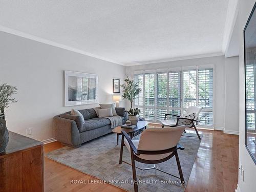 16 Cartwheel Millway, Toronto, ON - Indoor Photo Showing Living Room