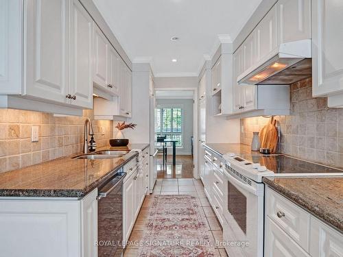 16 Cartwheel Millway, Toronto, ON - Indoor Photo Showing Kitchen With Double Sink With Upgraded Kitchen