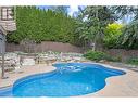 145 Magic Drive, Kelowna, BC  - Outdoor With In Ground Pool With Backyard 