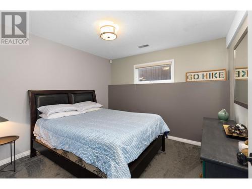 145 Magic Drive, Kelowna, BC - Indoor Photo Showing Bedroom