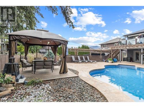 145 Magic Drive, Kelowna, BC - Outdoor With In Ground Pool With Backyard