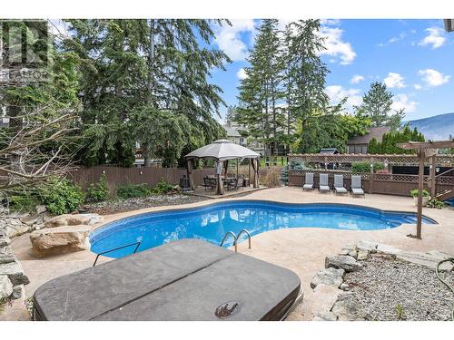 145 Magic Drive, Kelowna, BC - Outdoor With In Ground Pool With Backyard