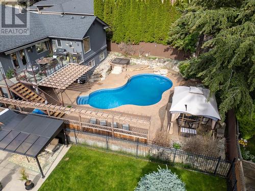 145 Magic Drive, Kelowna, BC - Outdoor With In Ground Pool