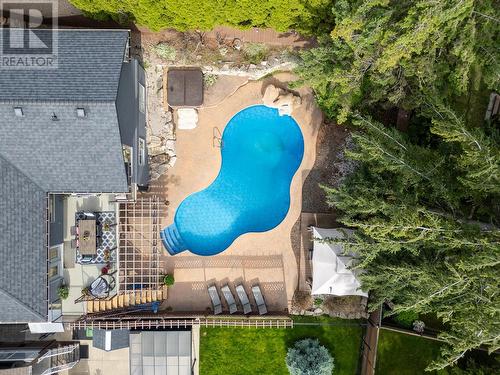 145 Magic Drive, Kelowna, BC - Outdoor With In Ground Pool