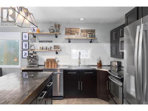 145 Magic Drive, Kelowna, BC - Indoor Photo Showing Kitchen With Upgraded Kitchen