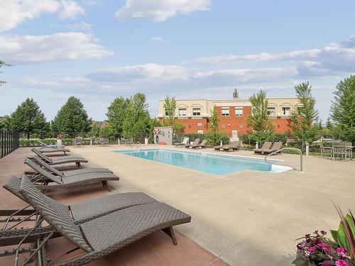 Piscine - 210-2480 Rue Des Nations, Montréal (Saint-Laurent), QC - Outdoor With In Ground Pool