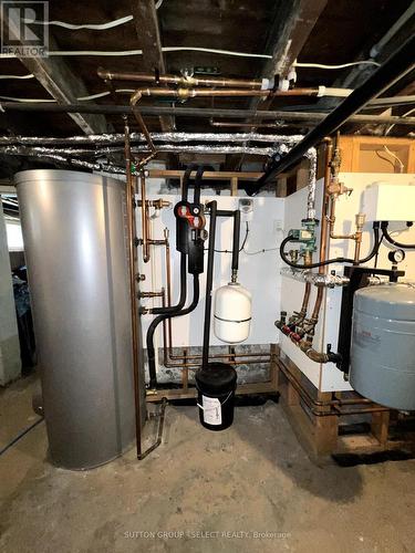 boiler heats hot water tank - 113 Wharncliffe Road N, London, ON - Indoor Photo Showing Basement