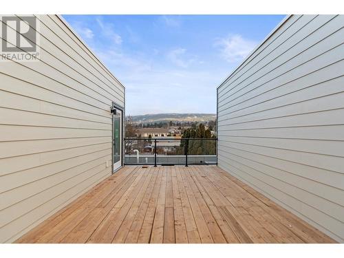 Middle Unit Roof Top Patio - glass. - 3907 26 Street Unit# 2, Vernon, BC - Outdoor With Deck Patio Veranda With Exterior