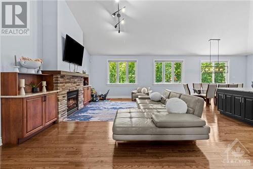 6800 Pebble Trail Way, Ottawa, ON - Indoor Photo Showing Living Room With Fireplace