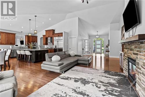 6800 Pebble Trail Way, Ottawa, ON - Indoor Photo Showing Living Room With Fireplace