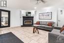 198 Scott Street Unit#404, St Catharines, ON  - Indoor Photo Showing Living Room With Fireplace 