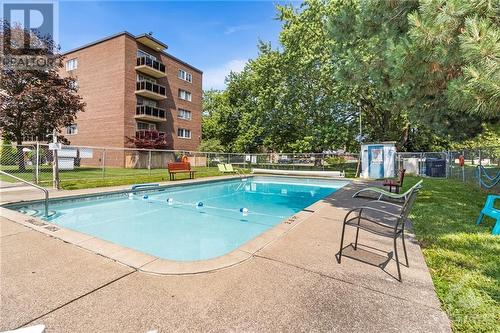 198 Scott Street Unit#404, St Catharines, ON - Outdoor With In Ground Pool