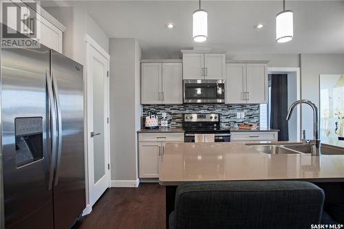 4857 Ferndale Crescent, Regina, SK - Indoor Photo Showing Kitchen With Double Sink With Upgraded Kitchen