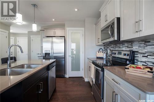 4857 Ferndale Crescent, Regina, SK - Indoor Photo Showing Kitchen With Double Sink With Upgraded Kitchen