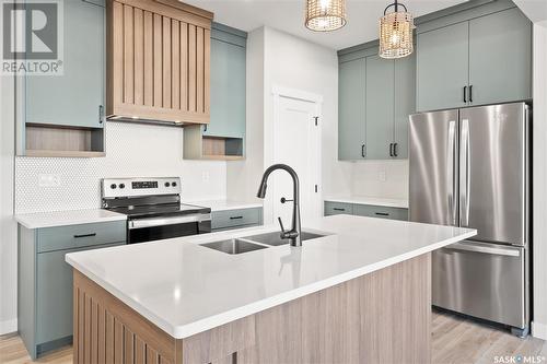 3123 Green Stone Road, Regina, SK - Indoor Photo Showing Kitchen With Double Sink With Upgraded Kitchen