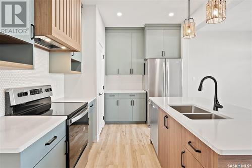 3123 Green Stone Road, Regina, SK - Indoor Photo Showing Kitchen With Double Sink With Upgraded Kitchen