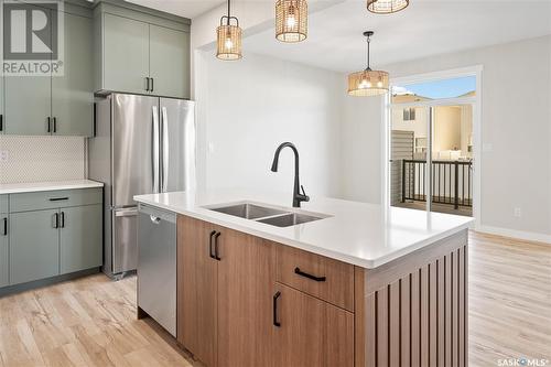 3123 Green Stone Road, Regina, SK - Indoor Photo Showing Kitchen With Double Sink With Upgraded Kitchen