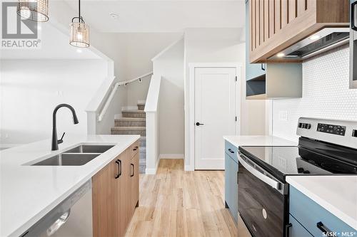 3123 Green Stone Road, Regina, SK - Indoor Photo Showing Kitchen With Double Sink With Upgraded Kitchen